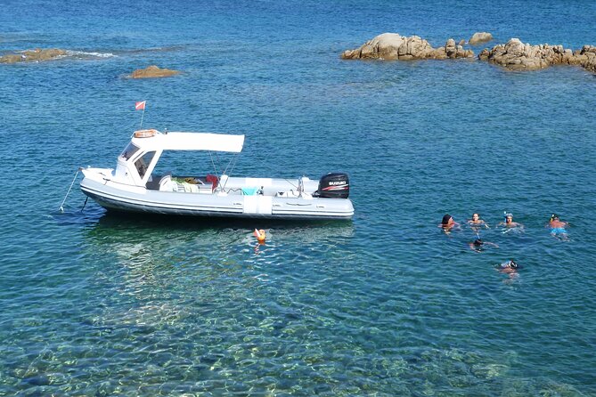 Boat tour to explore the Marine Protected Area of Tavolara - Capo Ceraso coves and swimming stops