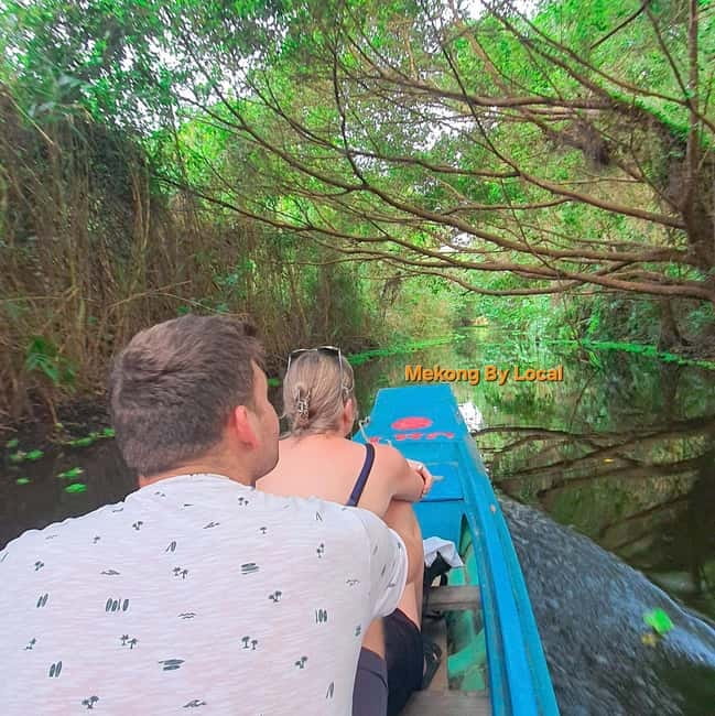 Can Tho: Lung Ngoc Hoang Nature Reserve and Mekong's Soul. - Taking a boat beneath the forest canopy