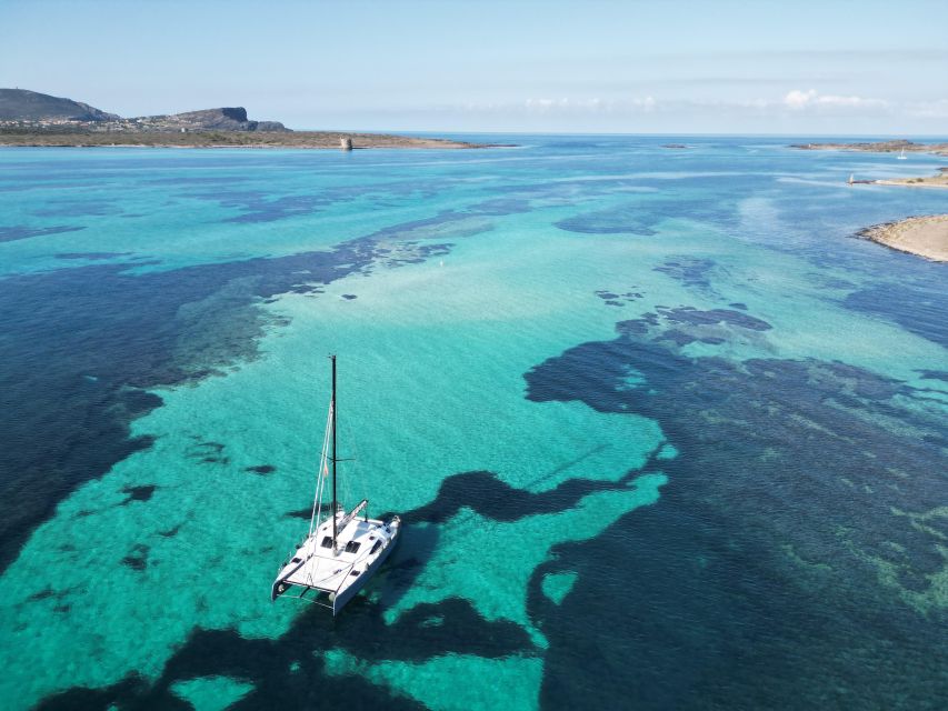 Catamaran tour Asinara island national park Buriana Charter - Sailing from Stintino toward Asinara