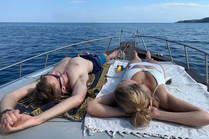Catania: Cyclops Islands & Timpa Nature Reserve Boat Tour - Equipment, refreshments, and comfort