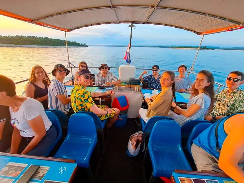 From Pula: Island Stop and National Park Day Cruise - The boat ride and onboard atmosphere