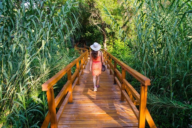 From Split: Krka Waterfalls Trip with Boat Cruise and Swimming - At Skradinski Buk, waterfalls and wooden paths
