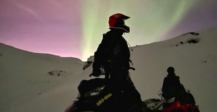 From Tromso: Arctic Wilderness Snowmobile Evening Tour - Leaving Tromsø for the winter night