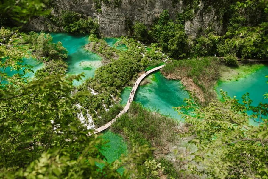 From Zagreb: Plitvice Lakes National Park Tour with Tickets - Four hours among bridges, water, and woodland