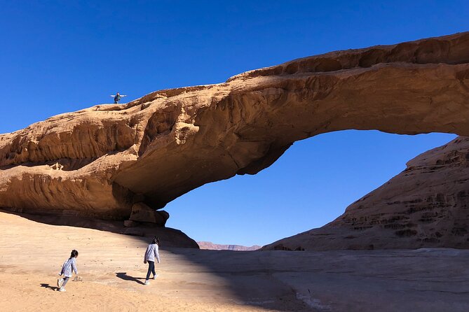 Full-Day 8 Hour Jeep Tour into Wadi Rum Protected Area with Stay - Um Sabatah sunset, tea, and a desert night