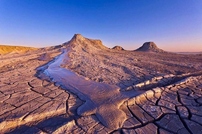 Gobustan National Park & Mud Volcanoes Tour - Reading the stones at Gobustan