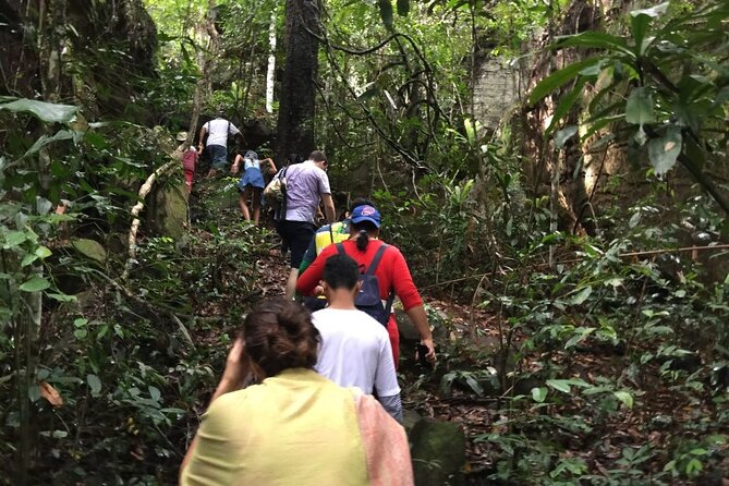 Jungle Trekking Tour at Phnom Kulen National Park from Siem Reap - A waterfall break beside the ancient river
