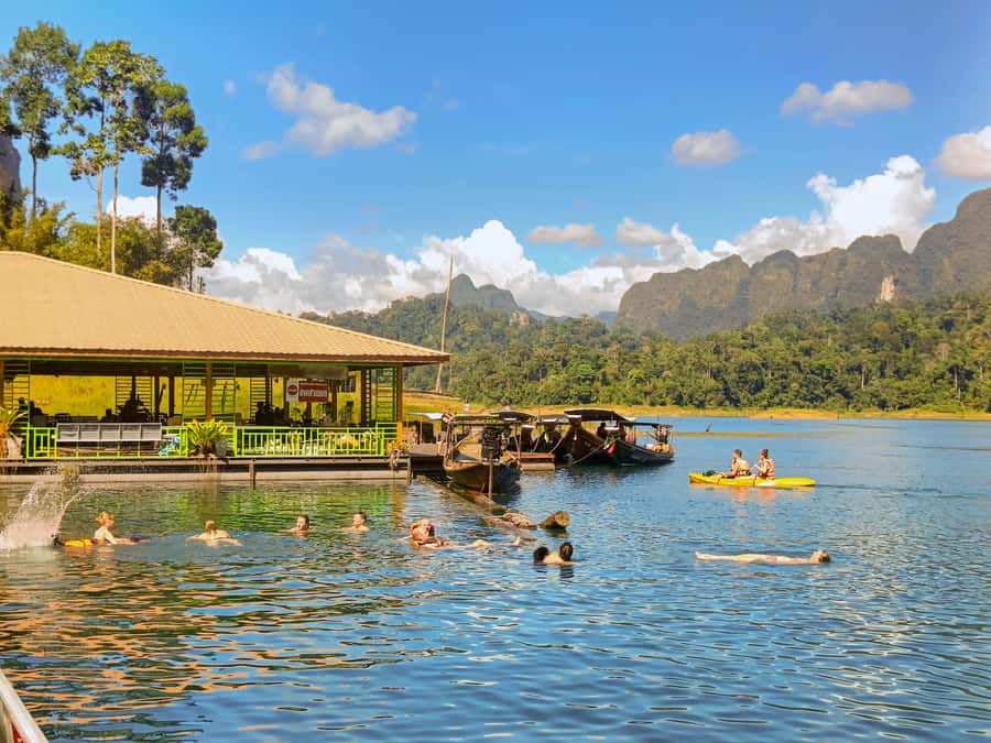 Krabi: Khao Sok National Park & Cheow Lan Lake Boat Tour - Kayaking and swimming in the emerald-green water