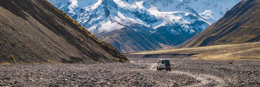 Lake Tekapo Scenic 4WD Cass Valley Wilderness Tour - Stream crossings and steep valley walls
