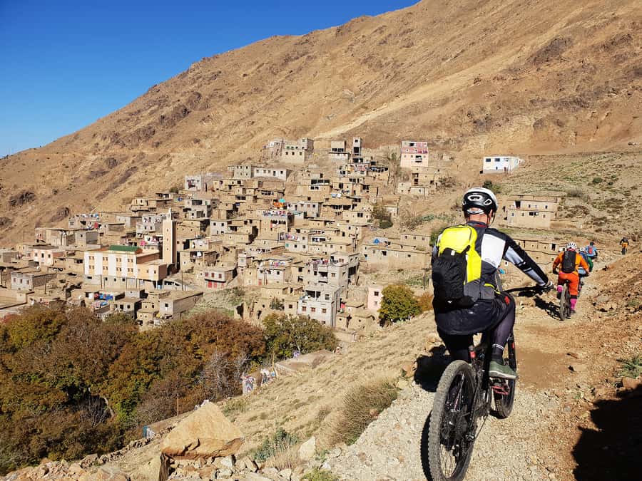 Marrakesh: Toubkal National Park Mountain Bike Trip w/Lunch - The descent through Tachedirt and nearby villages