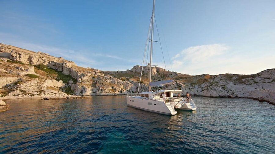 Olbia: catamaran tour in the Tavolara Marine Protected Area - Cala Moresca and Capo Ceraso for clear-water swimming