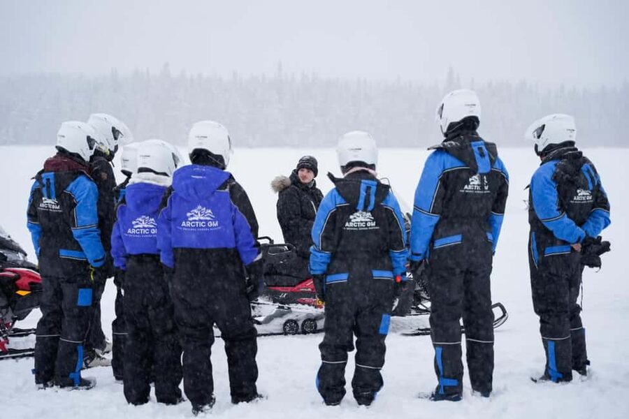 Rovaniemi: Guided Wilderness Snowmobile Safari & Barbeque - Fire, cabin, sausages, and hot drinks