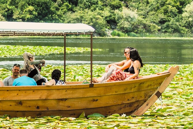 Skadar Lake National Park: Guided Boat Tour with Wooden Boat - Kamenik, floating leaves, and the wine stop