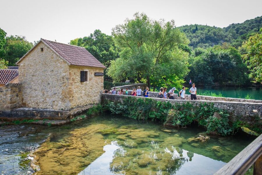 Split/Trogir: Krka National Park Day Trip with Wine Tasting - A 30-minute boat ride through the Krka canyon