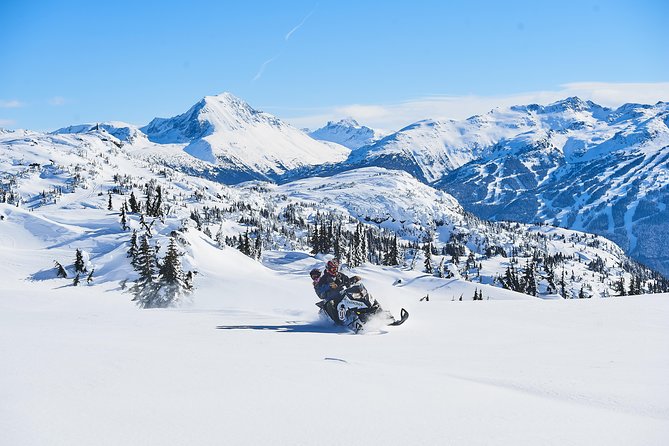 Whistler Wilderness Run Snowmobile Tour - Forest trails, steep climbs, and frozen lakes